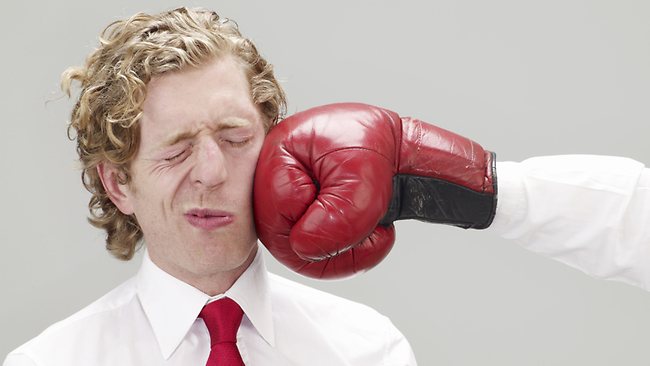 718614-businessman-punched